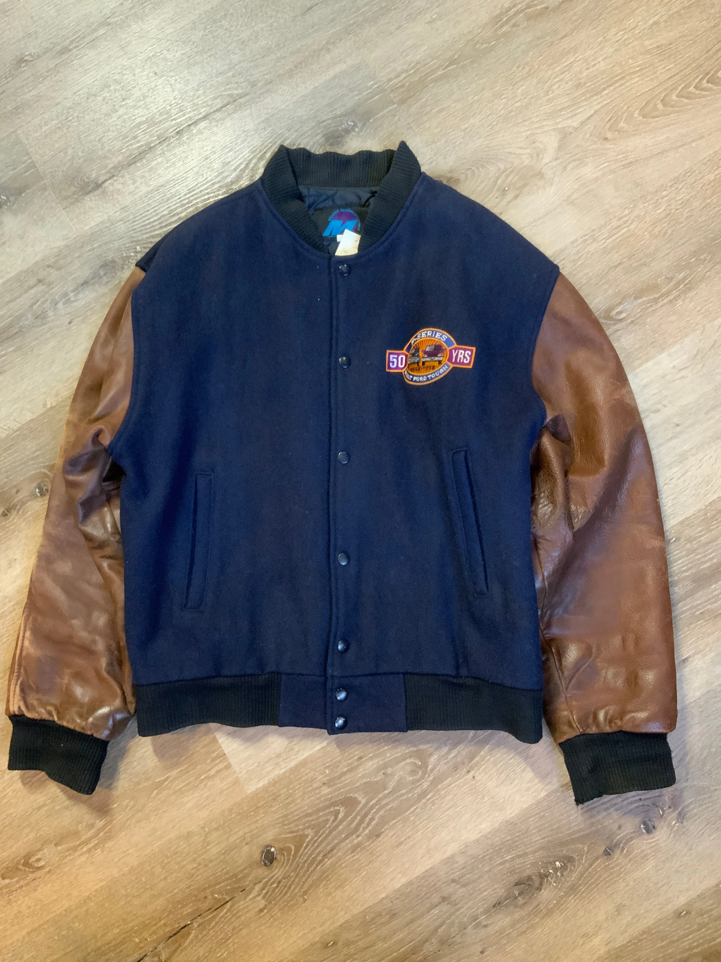 Ford F Series 50 Year Anniversary Navy and Brown Letterman’s Jacket, SOLD