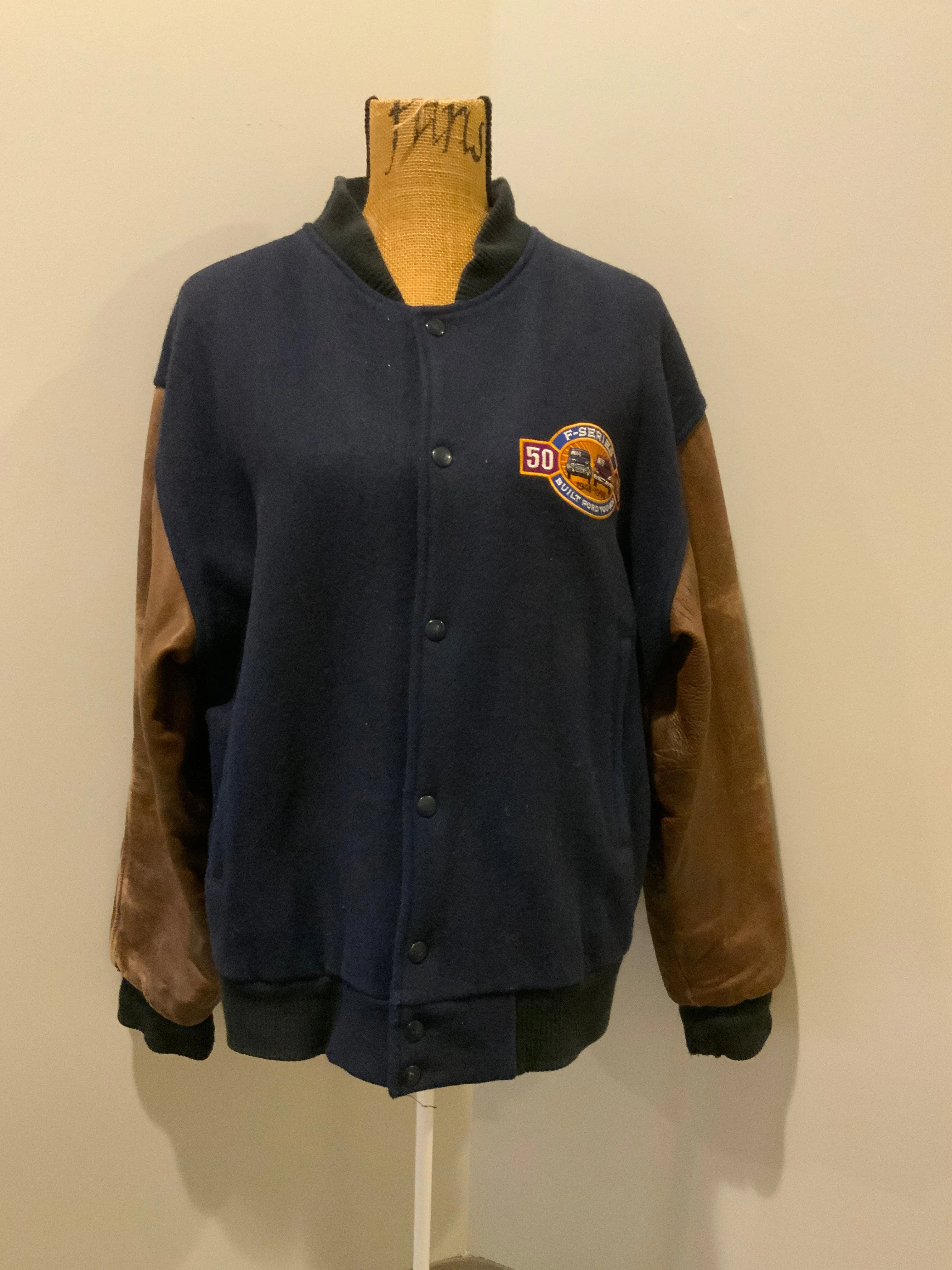 Ford F Series 50 Year Anniversary Navy and Brown Letterman’s Jacket, SOLD